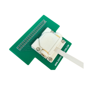 FFC clamped in PCB-mounted test fixture